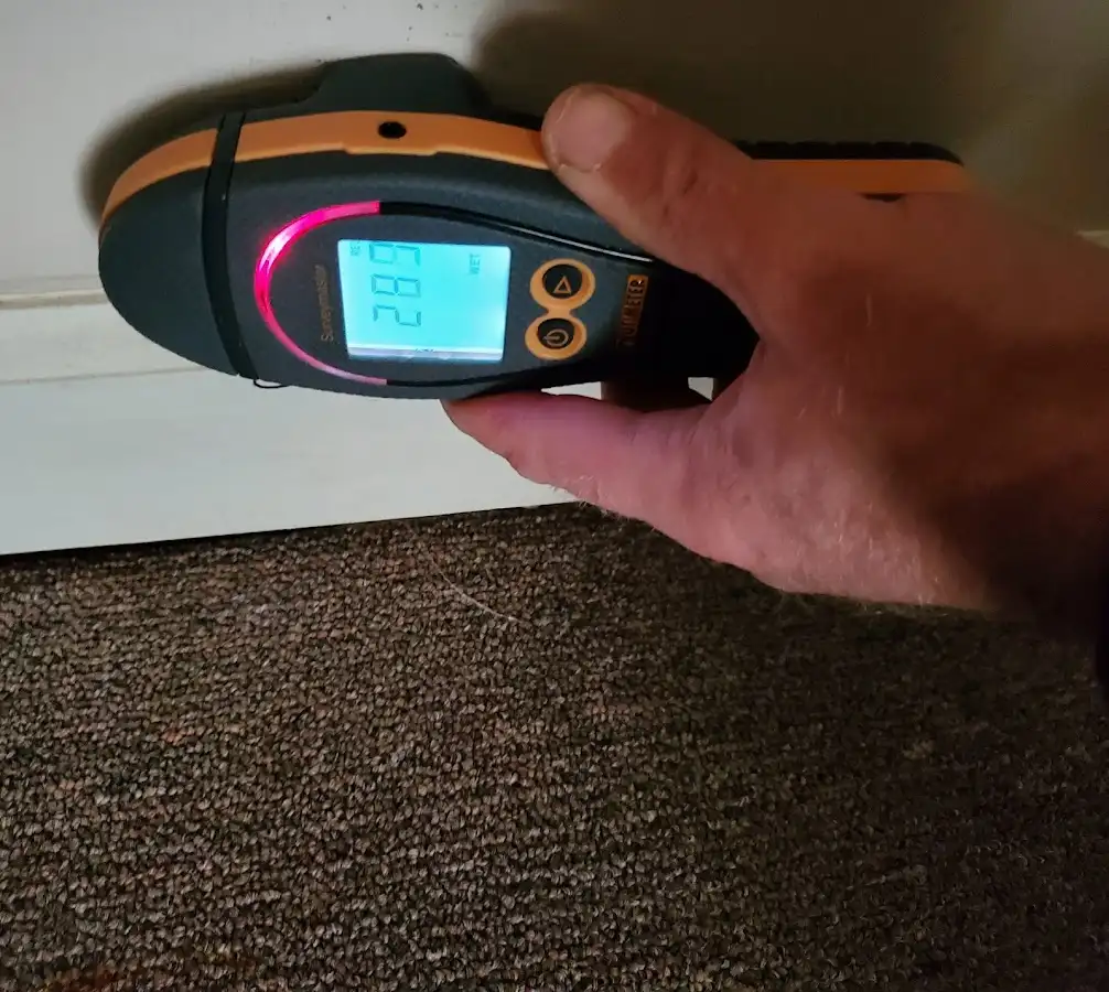 Moisture detection at baseboard during Sewage Cleanup & Sanitation in Central Falls
